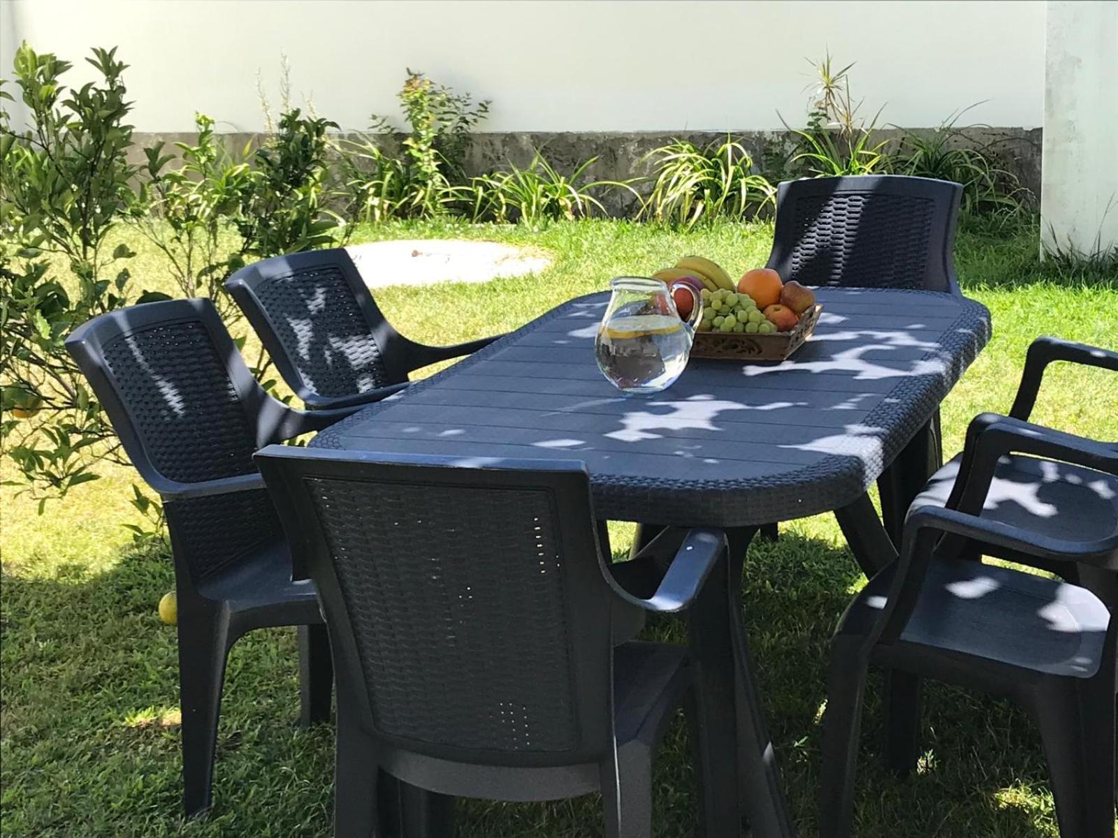 Arvore Cozy Com Jardim Luaran gambar